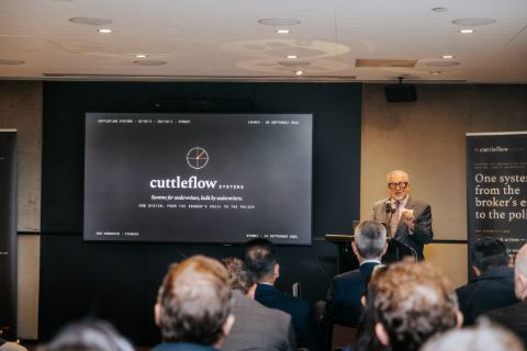 Cuttleflow launch, 10 September 2026, Level 29, 25 Martin Place, Sydney — Opening from the lectern, beneath the title slide (photograph 06 of 15)